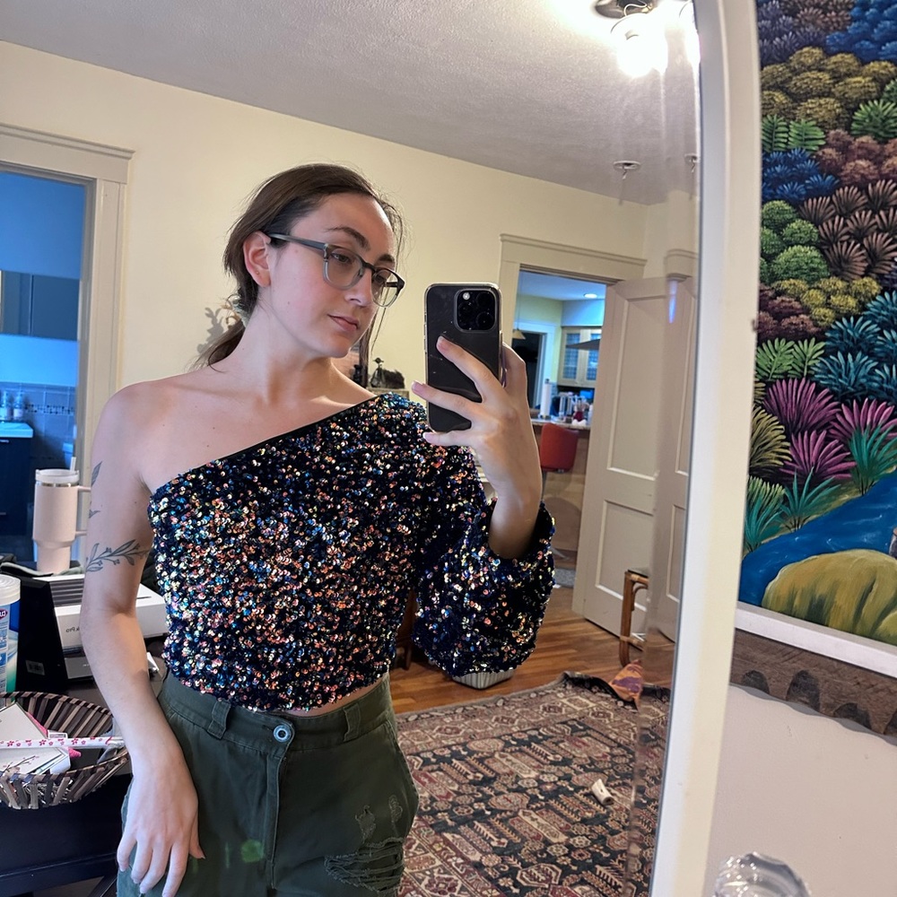 One shoulder sequin top.